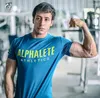 T-shirt da uomo ALPHALETE 2023 Mens Palestre Camicia Crossfit Fitness Bodybuilding Stampato Moda maschile Corto in cotone Abbigliamento Marca Tee Tops