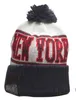 2023 Sideline Historic Pom Cuffed Knit Hat Cream Team Football Beanies Teams Knits Hats Mix And Match All Caps