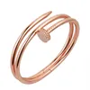 nagelserien Bangle Au 750 18 K Gold Plated Brass aldrig Fade Officiella Replica Jewelry Top Quality Luxury Brand Par Bangles Class213U