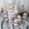 Andra evenemangsfest levererar transparent Clear Candy Box med konstgjorda blommor band bröllop souvenirer för gäster matt dragees chokladdop 231011