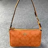 Slingväskor 2023 Olay New Women's Bag Classic Orange Flower One Shoulder Underarm Nolita19 Zippered Mahjong Purses Luxury