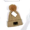 2023 Ny vinter 100% kashmir stickade huvudgear Kvinnor håller varm mössa hatt högkvalitativ solid casual säkringskallar