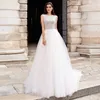 Scoop a-line Brautkleider ärmellose Applikationen Pailletten Tüll Sweep Zug Elegante Prinzessin Langes Brautkleid für Frauen