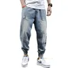 Jeans pour hommes Mode Ripped Pantalon élastique en détresse Hip Hop pour hommes Zipper Casual Homme Crâne blanchi Harem Pantalon crayon 245e