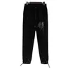 Amirly Mens Designer Felpe con cappuccio Felpe con cappuccio Pantaloni sportivi con stampa Trend Lettera Spruzzi di inchiostro Dripping Jogger Tuta da uomo Taglia S-XL