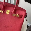 Designer -Einkaufstasche Berkins Lady Classic Litchi Grain Leder Handtasche Reine rote Kapazität Mode Top First Layer Cowhide XYCs