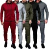 Tute da uomo Tuta da uomo Sport 2 pezzi Set Giacca casual Pantaloni da jogging Allenatore atletico Abito in cotone solido Abbigliamento da corsa