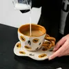 Tazze Piattini Tazza da caffè e piatto in ceramica creativa Regalo di alta bellezza Tazza disegnata a mano Colazione Tè pomeridiano Dim Sum