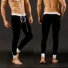 Men's Thermal Underwear New Men's Thermo Underwear Fashion Men Thermal Long Johns Mens Sexy Underwear Penis Pouch Warm Leggings Pants TrousersL231011