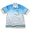 23SS Casablanca Beach Shirt Style Blue Gradient Tennis Court Hawaiian Shirts Herr- och kvinnors mångsidiga korta ärmskjorta Casablanc