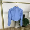 Damenblusen 2023 Herbst Holzohrkante Abnehmbares Design Kurze gefaltete Kleidung Blau Gelb Baumwolle Langarm Slim Shirt Tops