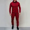 Tute da uomo Tuta da uomo Sport 2 pezzi Set Giacca casual Pantaloni da jogging Allenatore atletico Abito in cotone solido Abbigliamento da corsa