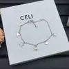 Celi Arc de Triomphe Love Pearl Pendant Necklaceブレスレットとエレガントな雰囲気の小さなデザインクラビクルチェーン女性