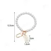 Keychains Lanyards Vintage Imitatin Pearl KeyChain Bag Charm Simple Wristlet Bead Key Chain for Women Cute DIY Pendant Mobiltelefondekoration 231011