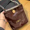 Stor varumärke mini hinkväska 22bag designer handväska axelväska plakar designer kvinna handväska metallkedja med märke 23 cm