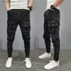 Jeans pour hommes Nouveau pantalon cargo homme haute rue hip-hop personnalité tendance salopette pantalons décontractés jean homme pantalon baggy pantalon ajusté y2kL231011