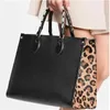 Sac de créateur GM MM OnTheGo Tote Grands fourre-tout en déplacement Emboss Momie Sac Luxurys Sacs à main Sac de shopping Femme Sac à main en cuir véritable Sac fourre-tout Sac de shopping