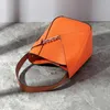 イブニングバッグMSシックな女性の本物の革のバッグショルダーハンドバッグとプロセス2023年のヨーロッパアメリカンスタイルの豪華なオレンジトート