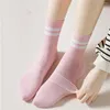 Femmes chaussettes Dreamlikelin 5 paires/lot Simple Style coréen coloré rayé étudiants filles sport Tube moyen