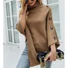 Kvinnors tröjor Vintage -knapp Poncho Kvinnors tröja Autumn Winter Overized Turtleneck Pullover Knitwear Tops Batwing Sleeve Cape Jumper