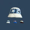 Brede rand hoeden emmer hoeden handgemaakte haakbloem emmer hoed voor meisjes Koreaans reis strand panama caps ontwerp gebreide hoed winter beanie wol warme pet 231011