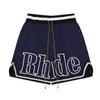 Rhude Hommes Shorts Designer Court Hommes Été Casual Haute Qualité Plage Pour Hommes Respirant Imperméable Et Absorbant La Sueur Vêtements C9TX