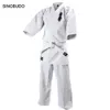 Skyddsutrustning högkvalitativ Kyokushinkai Dogi Dobok 12oz 100% bomullsduk Karate Uniform Kimono Gi Tyg för barn Vuxen gratis vitt bälte 231011