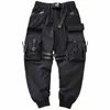 Męskie spodnie Hip Hop Button Butbons Pockets Joggers Fashion Techwear Pencil Spodni Side Harem dla mężczyzn