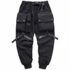 Męskie spodnie Hip Hop Button Butbons Pockets Joggers Fashion Techwear Pencil Spodni Side Harem dla mężczyzn