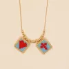 Collares colgantes Collar con cuentas Moda Simplicidad Cruces en forma de corazón Signo colgante Tejido a mano Bohemio Cuenta de arroz ajustable