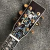 Nouvelle guitare acoustique à 6 cordes. Spruce Plavage et palissandre arrière et côtés, manche en ébène, incrustation de coquille d'ormeau, super luxe.Toute guitare solide