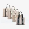 Topp kvinnliga handväskor Woody Tote Shopping Bag Handbag Quality Canvas Nylon Fashion Linen Stora strandväskor Luxur Designer Travel Cros247Z