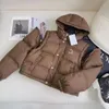 Womens Designer Down Jacket Varma tjocka lösa vinterkvinnor Högkvalitativa jackor Korta huva päls krage bomullsbeläggning avslappnad värme 2023