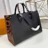 Sac de créateur GM MM OnTheGo Tote Grands fourre-tout en déplacement Emboss Momie Sac Luxurys Sacs à main Sac de shopping Femme Sac à main en cuir véritable Sac fourre-tout Sac de shopping