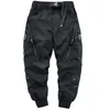 Męskie spodnie Hip Hop Button Butbons Pockets Joggers Fashion Techwear Pencil Spodni Side Harem dla mężczyzn