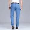 Pantalones vaqueros para hombre Primavera Verano fino azul claro suelto moda de negocios tela Lyocell pantalones de mezclilla elásticos pantalones de marca masculina 231012