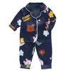 Pyjamas barns pyjamas set vår baby pojke flicka kläder avslappnad sömnkläder set barn tecknad toppar byxor 2pieces småbarnskläder set 231012