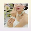 Rhodium Silver Tone IvoryCream Pearl Bridal Jewelry Set Wedding Necklace Bracelet and Earrings Sets1285313