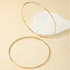 wholesale Pendientes de aro de círculo grande de 10 cm grandes de color dorado baratos para mujeres niñas Pendientes de gota geométricos de moda simple joyería