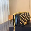 Neue beliebte Mode-Handtasche, luxuriöses Material, Designer-Tasche, einzigartige Vorteile, charmante, exotische, gewebte Tasche aus schwarzem Gold