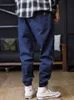 Mäns jeans plus storlek jeans män lösa joggar streetwear harem jeans lastbyxor fotledslängd denim trussl231011