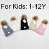 1-12Y Enfants Chaud Chapeaux D'hiver Designer Bonnet Seau Chapeau De Père Noël Bobble Bonnet Tricoté Bonnet Chapeaux pour Enfants Casquettes De Crâne Lettres Chapeau Ajusté 5 Couleurs