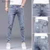 メンズジーンズ2023春と秋の新しいファッションソリッドカラーホールスモールフィートパンツメンカジュアルスリム快適な弾性高品質のジーンズ36L231011