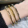 Bracelet de haute qualité couleur argent et or demi-Zircon serrure Bracelet pour femme bijoux de mode (DJ2440)