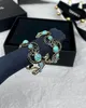 Mill Price 럭셔리 여성 여성의 23a New Blue Turquoise Black Diamond Half Circle Earrings 스터드 레이디 펑크 과장된 드롭 귀걸이 이어 드롭