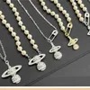 Pinzirkon-Anhänger Saturn-Halskette für Frauen Gold Herrenkette exquisite luxuriöse Planet Pin-Halskette Modische Diamanteinlage 925253Z