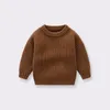 カーディガンベイビーセーター秋の冬のソリッドカラー幼児のための編み付けセータールーズラウンドネックキッズアウトウェア服231013