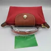 Borsa a manico singolo 2024 Borsa a mano Piccola Cognac Liquidazione Freight Source Donna in pelle al dettaglio Borse da donna Portafoglio all'ingrosso Mifan Mini Femme Gnocco a buon mercato