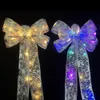 Décorations de Noël Cimier d'arbre de Noël Arc LED Glow Ornement de Noël Paillettes Satin Mesh Streamer Suspendu Ensemble décoratif pour la décoration de Noël 231013