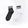 Chaussettes pour hommes 7 paires de bas de tube moyen couleur unie coton long déodorant japonais sport basket-ball